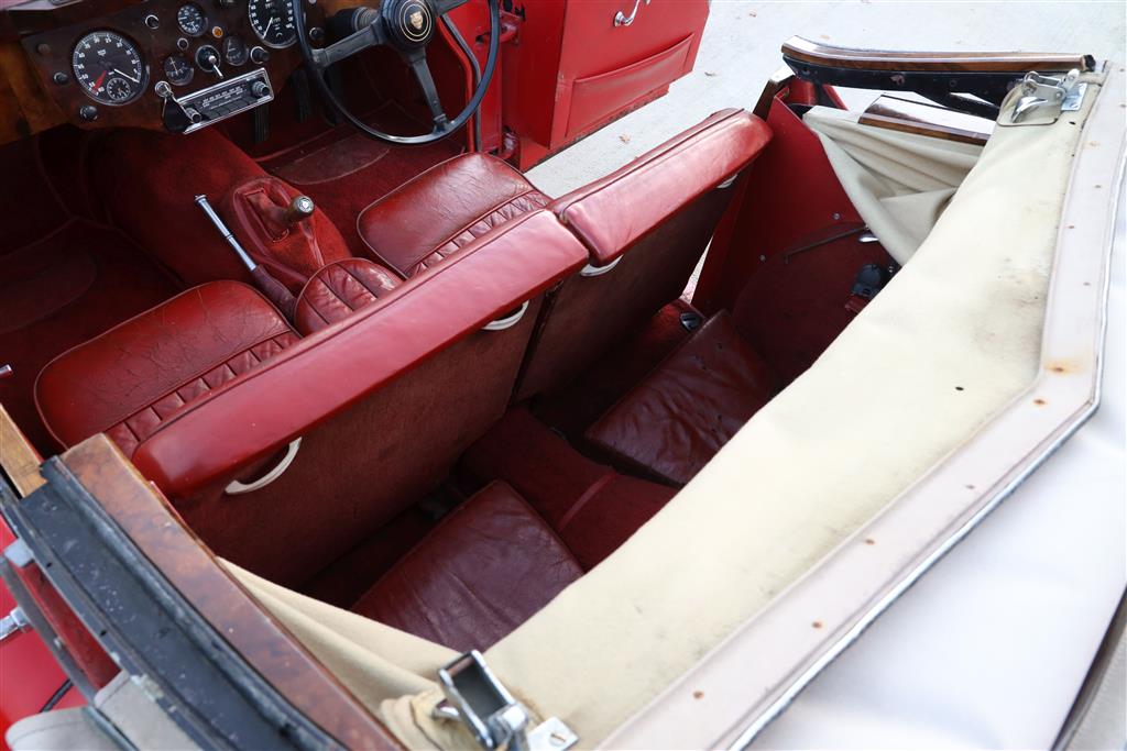 A 1955 Jaguar XK140 DHC